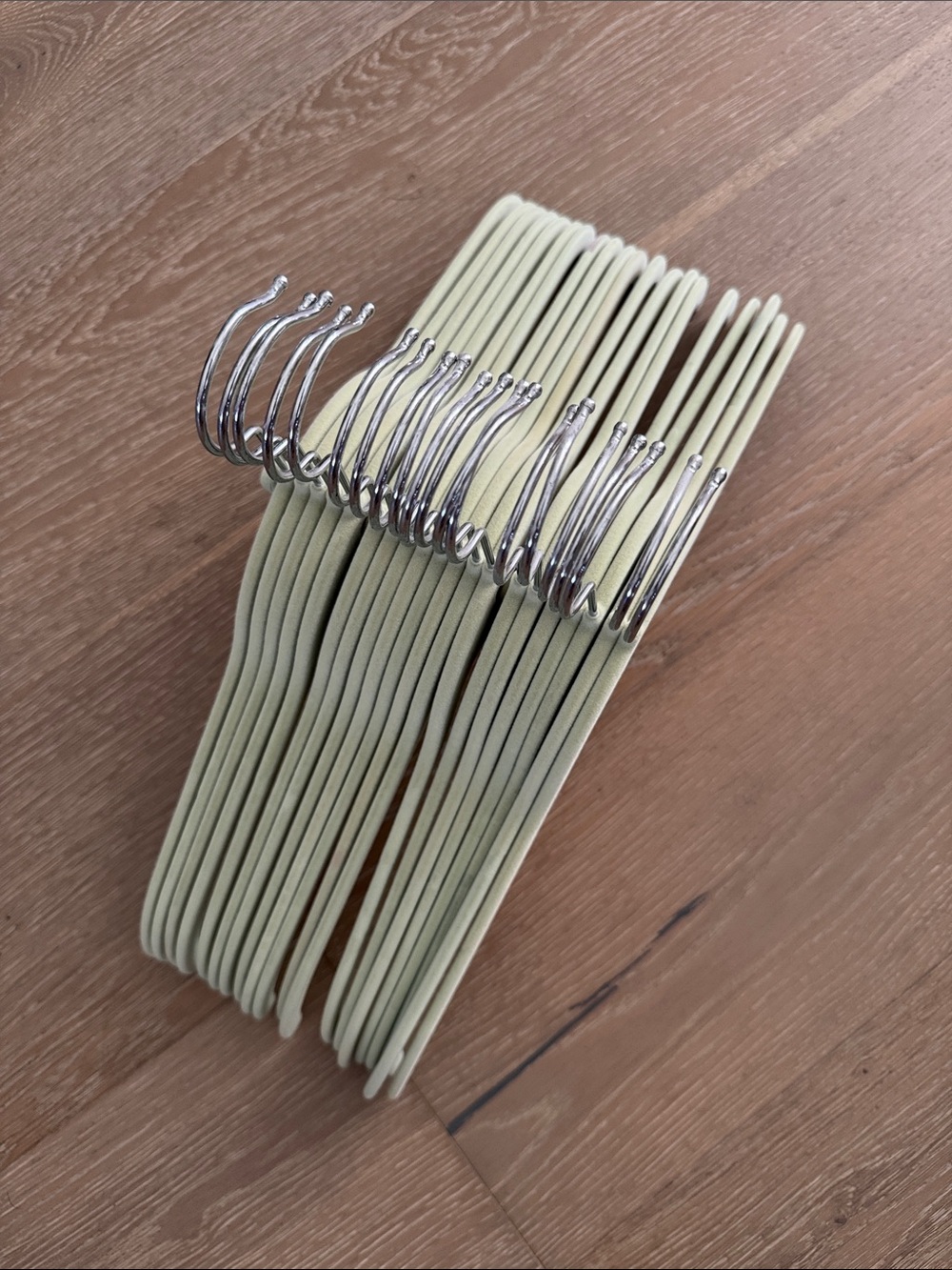 Set of 20 light Sage Green Slim Clothing Hangers with Chrome Hooks .